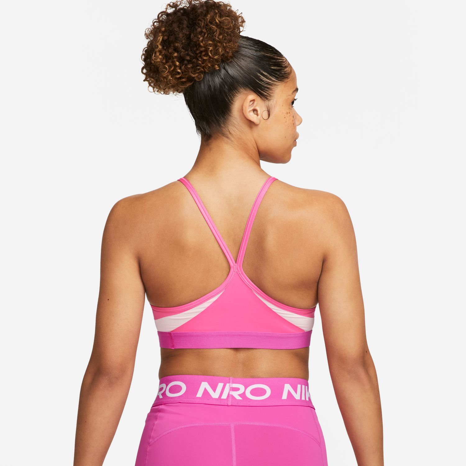 Nike W NK INDY V NECK BRA enski sportski top roza Intersport